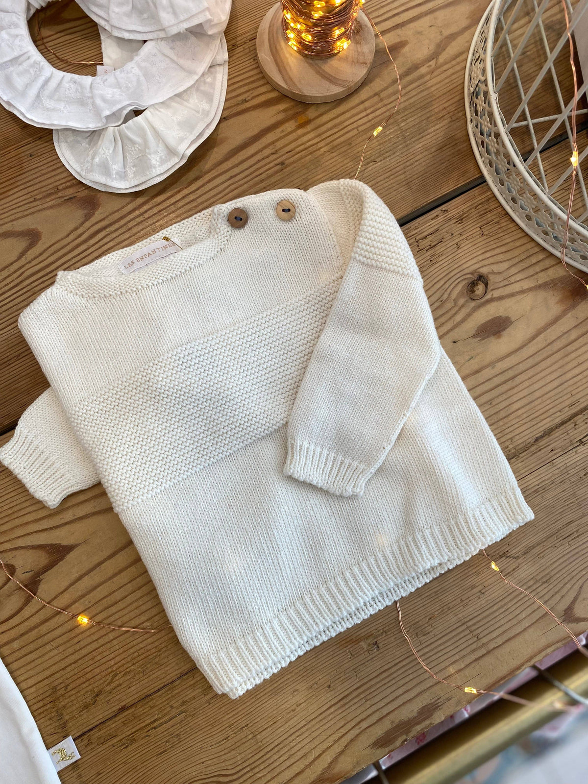 White foam sweater